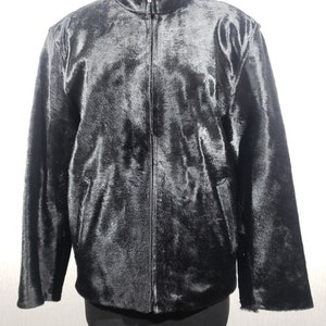 Mlack men&#39;s fur jacket with a metal zip. Men&#39;s sheepskin coat on warm genuine fur.