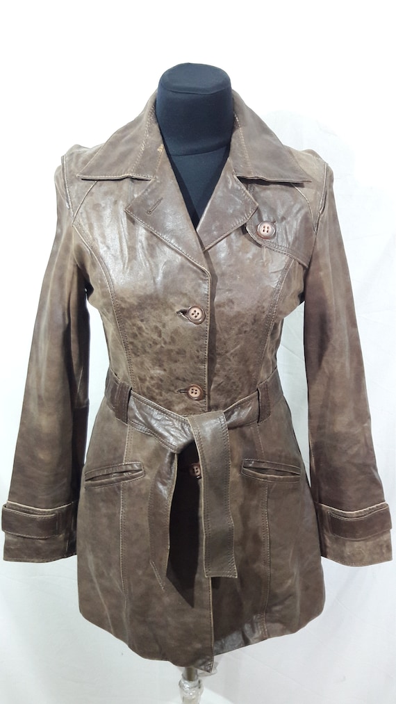 A simple long jacket. Women's jacket made of genui