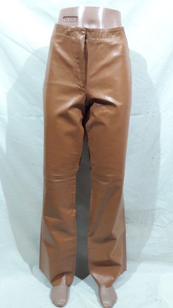 Simple women's genuine leather pants. Light brown