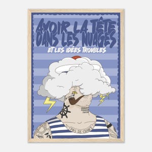 May include: A framed art print featuring a sailor with a cloud for a head, smoking a pipe. The artwork includes tattoos, a striped shirt, and the French text "AVOIR LA TÊTE DANS LES NUAGES ET LES IDÉES TROUBLES" and "PAS DE CHANCE".