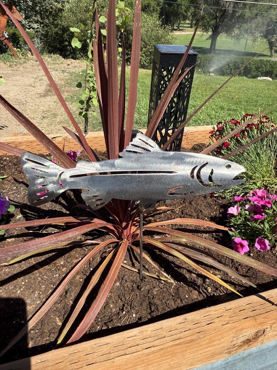 Metal Trout wall and garden art made out of steel with high gloss sparkle powder coat finish. 14 in long