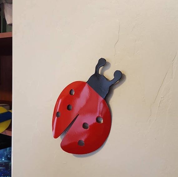 Lady bug ready for its new home! This lady bug is made of 18 gauge steel and hand bent,