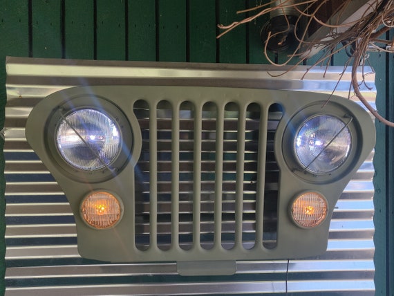 1970 Original Jeep Grill with remote control Color change Headlights, Led park lights, painted army green.