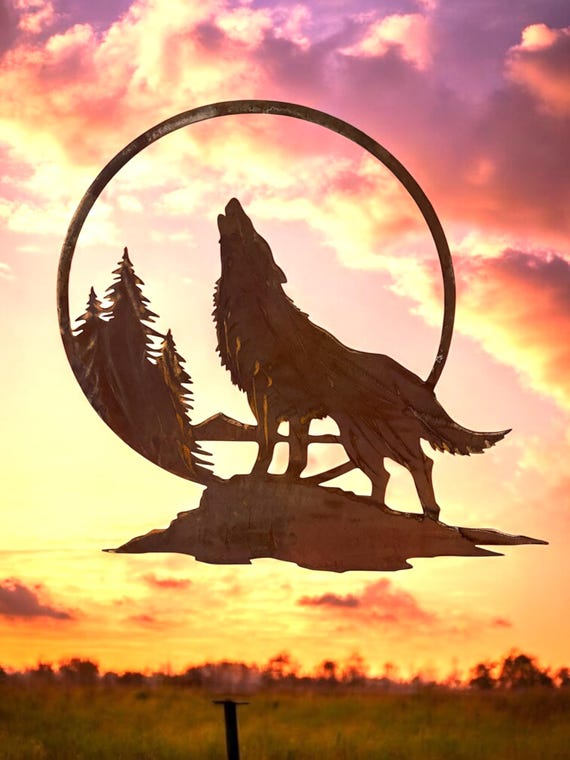 Wolf howling mountain scene wall art with rust patina with copper highlights.