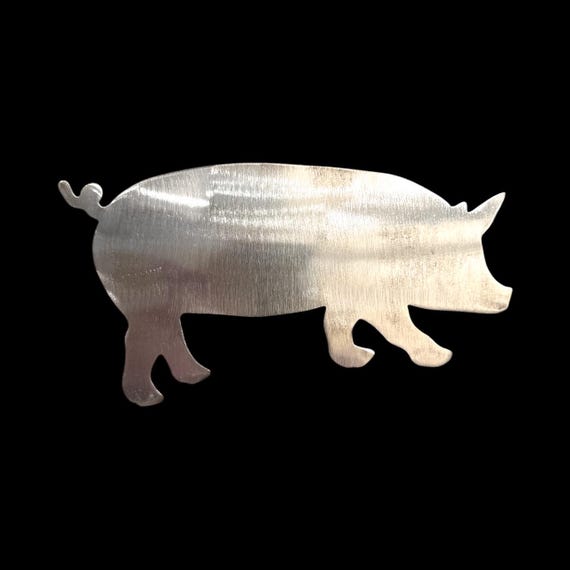 Pig made out of 18-gauge steel. Unfinished for crafts and DIY projects