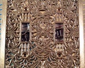 Mid century ornate brass double light switch plate cover. Vintage stock. New in package. Prism collection switch plate cover. Made in Taiwan