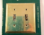 Vintage 70 39 s brass double light switch plate cover. Old stock. New in package. Lawuered brass switch plate cover. Made in Canada.