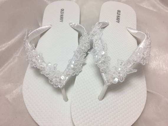 white lace flip flops