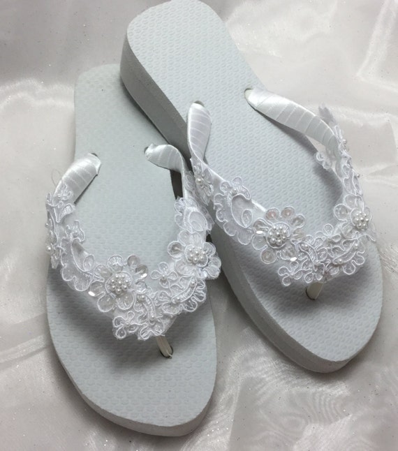 white lace flip flops