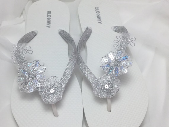 silver flip flop sandals