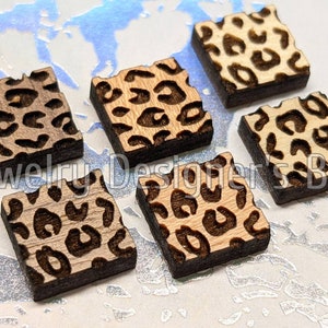 10 mm cabochon met luipaardprint - diep gegraveerde houten versieringen - kersenhout, walnoot, berkenhout - semi-matte vernis