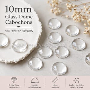 May include: A collection of 10mm clear glass dome cabochons with a smooth, rounded surface. The image includes text stating 10mm Glass Dome Cabochons, Clear, Smooth, High Quality, Jewelry Designer's Btq., Crystal Clear Transparency, and 10mm Diameter.