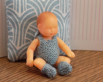 1:12 3D printed newborn doll's house doll in a hand knitted romper and booties set
