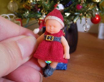 1:12 Baby newborn doll for the doll's house wearing an adorable Christmas outfit by Angela Turner