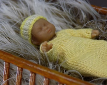 1:12 DOLL 3D printed new born Baby for the Doll's House wearing a hand knitted gown with matching hat by Angela Turner