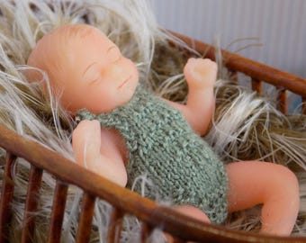 1:6 DOLL dressed in a hand knitted romper using merino yarn