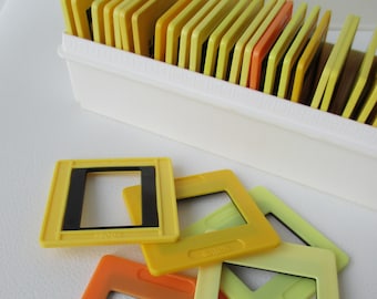 Vintage slide frame set of 36 in original plastic box, orange, yellow and black colour, Soviet diapositive photo frames, made in USSR