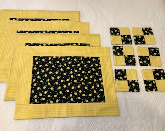 4 Beautiful summer lemon quilted reversible placemats and 6 coasters Sold as a set