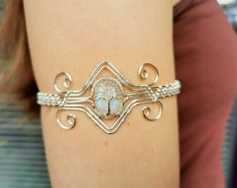 Tree arm ring with a moonstone gemstone