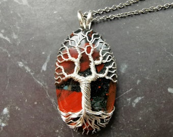 Tree pendant with a blood stone gemstone