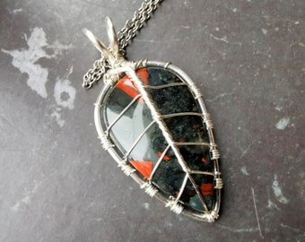 Leaf pendant with a blood stone gemstone