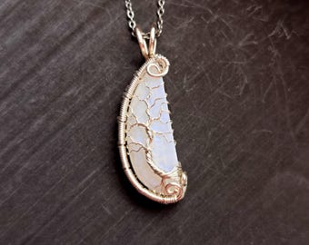 Tree pendant with a broken moonstone