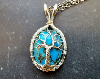 Tree pendant with a turquoise gemstone