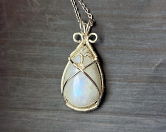 Tree pendant with a moonstone gemstone
