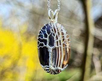 Tree pendant with a black onyx gemstone