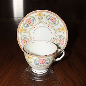 England Fine Bone China ENGLAND Handpainted Numbered SUTHERLAND Cup and Saucer