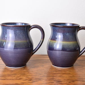 May include: A rustic wooden sign with the text "Welcome to our home" in a handwritten style. The sign features a distressed finish and a simple, inviting design, perfect for a front porch or entryway.