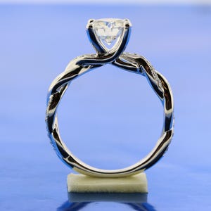 Twisted Diamond Band Round 7mm Forever One Moissanite Engagement Ring, Cathedral Setting With Mil-Grain Band In 18k White Gold. image 4