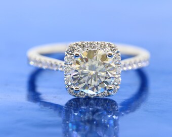 Classic Cushion Halo Round 7.0mm Forever Brilliant Moissanite by Charles & Colvard Engagement Ring in 18k White Gold.