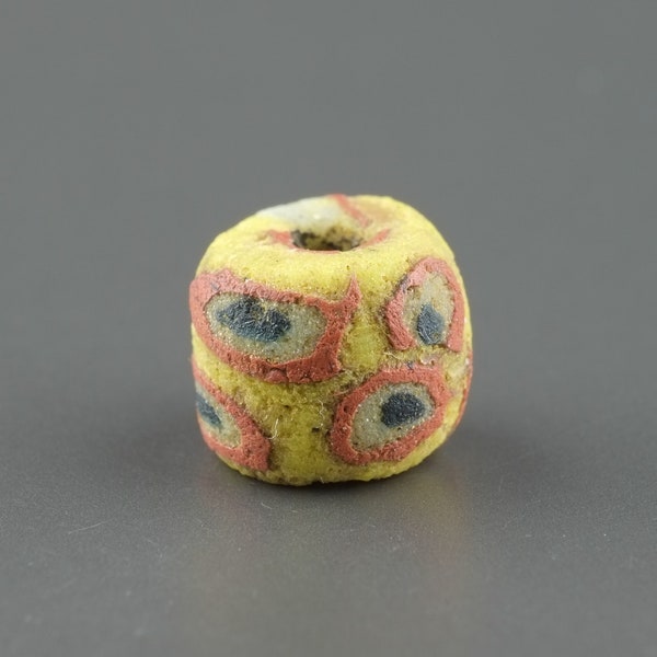 Antique glass bead, Old yellow glass bead, Byzantine/Islamic period