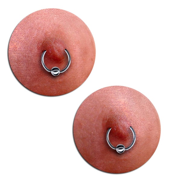 Women Tired Of Instagram's Double Standards Are Superimposing Men's Nipples Onto Their Own Quartz