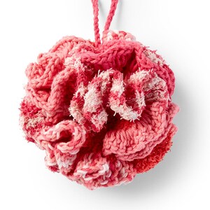 May include: A pink and white crocheted bath pouf with a hanging loop.