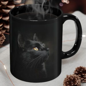 Black cat coffee mug.
