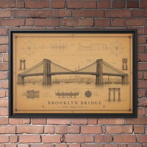 May include: A framed vintage-style architectural print of the Brooklyn Bridge in New York City. The tan-colored paper features detailed black line drawings of the bridge, structural diagrams, compass roses, and the text Brooklyn Bridge New York City.