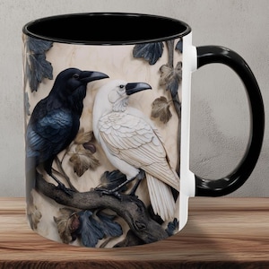 Black and albino white ravens or crows coffee mug.