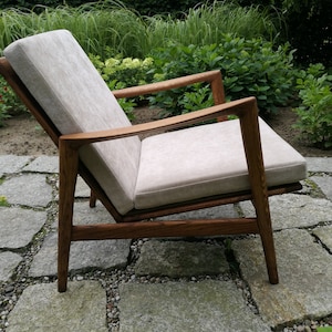 Customisable, Scandinavian lounge chair, iconic, the ultimate seating,fashionable interior, cushioned, low-slung,armchair,customisable