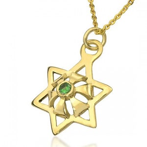May include: A gold pendant necklace with a detailed Star of David design featuring a green gemstone in the center.