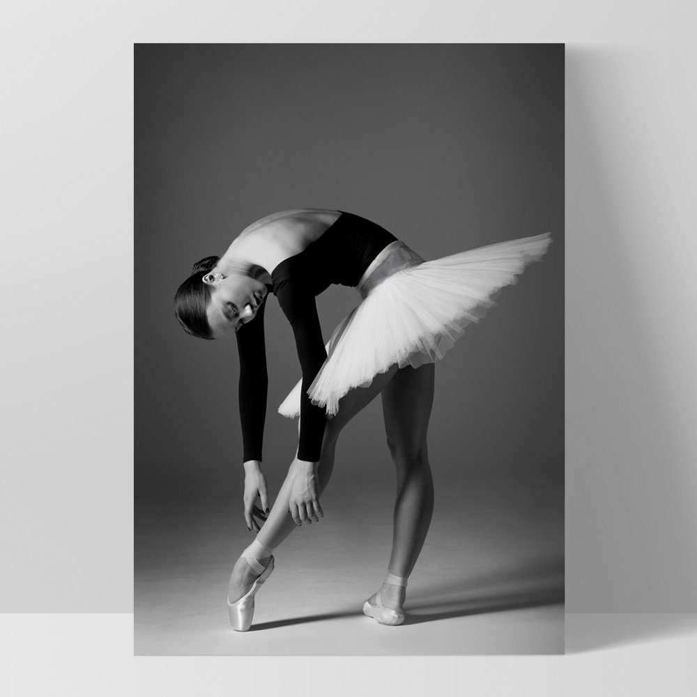 Premium Photo  Ballerina in a white dance package white tights pointe  shoes dances ballet beautifully in a dark