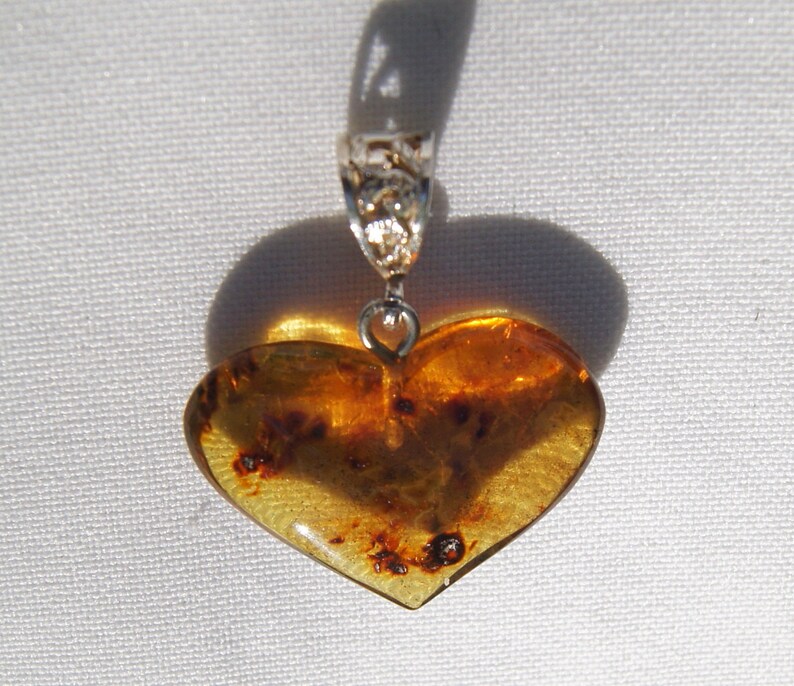 Original And Genuine Dominican Heart Shape Red And Bluish Amber .925 Amber Pendant Sterling Silver Reversible Pendant Jewelry