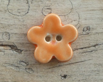 Handmade ceramic blossom flower button