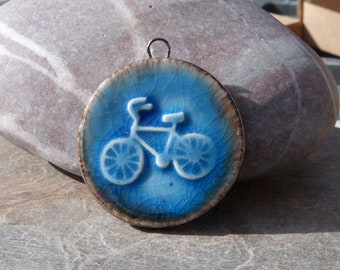 Handmade blue and bronze bicycle pendant