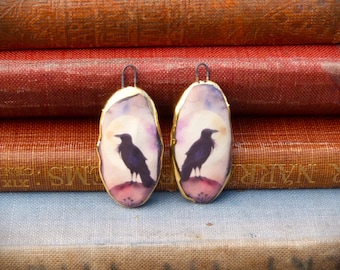Handmade ceramic charms: Raven illustration with a 24kt gold lustre edge