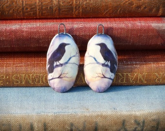 Handmade ceramic charms: Raven illustration