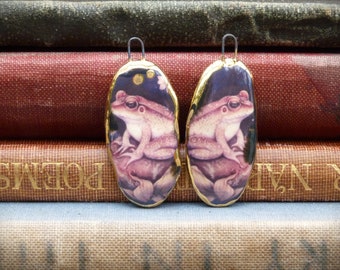 Handmade ceramic frog/toad illustration charms with a 24kt gold lustre edge