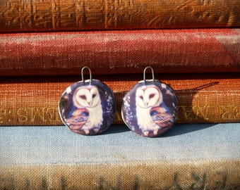 Handmade ceramic owl charms.