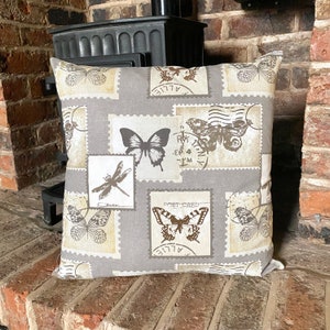 725. Papillons et cartes postales Housse de coussin 100% coton. Différentes tailles